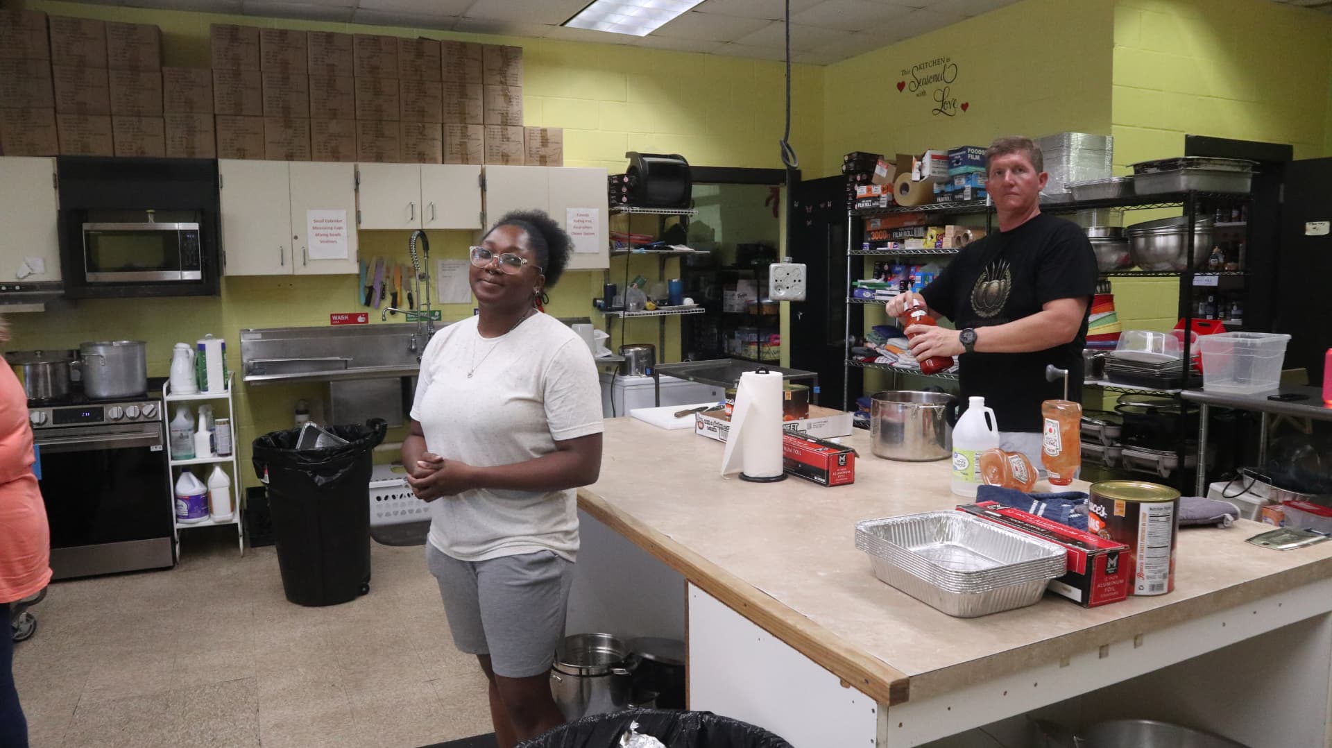 Veterans Phalanx volunteers working together in the kitchen during Team Mess Hall.